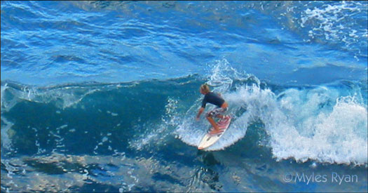 Surfer at Polulu Beach